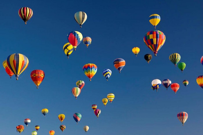 many-vividly-colored-hot-air-balloons-ralph-lee-hopkins