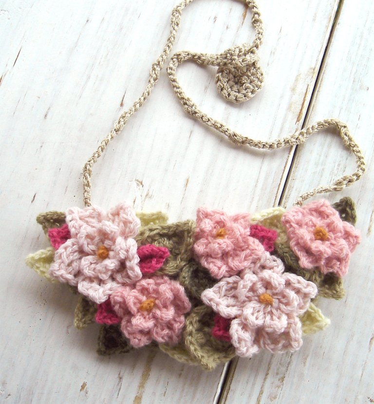 crochet_bib_necklace_in_soft_pink_flowers_by_meekssandygirl-d4kln8k
