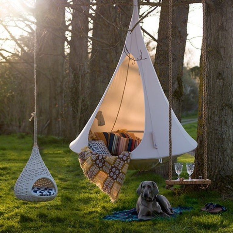 Hanging Cacoon Hammock Chair that works as a hammock chair and a hanging tent which make it perfect for camping or even relaxing at your home, backyard, garden or any other place in which you can hang it.