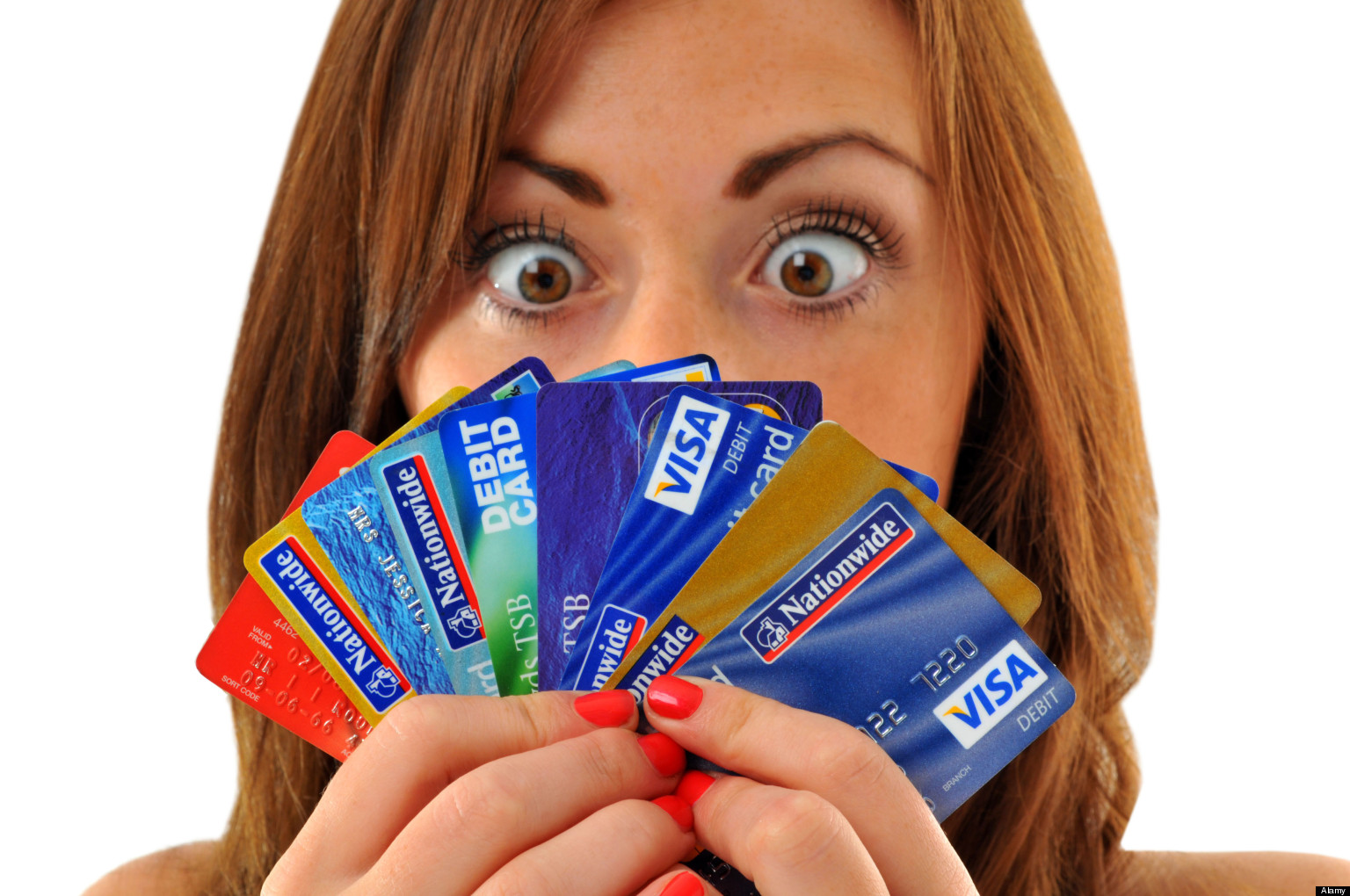 Credit cards, woman holding lots of credit and debit cards. Image shot 09/2010. Exact date unknown.