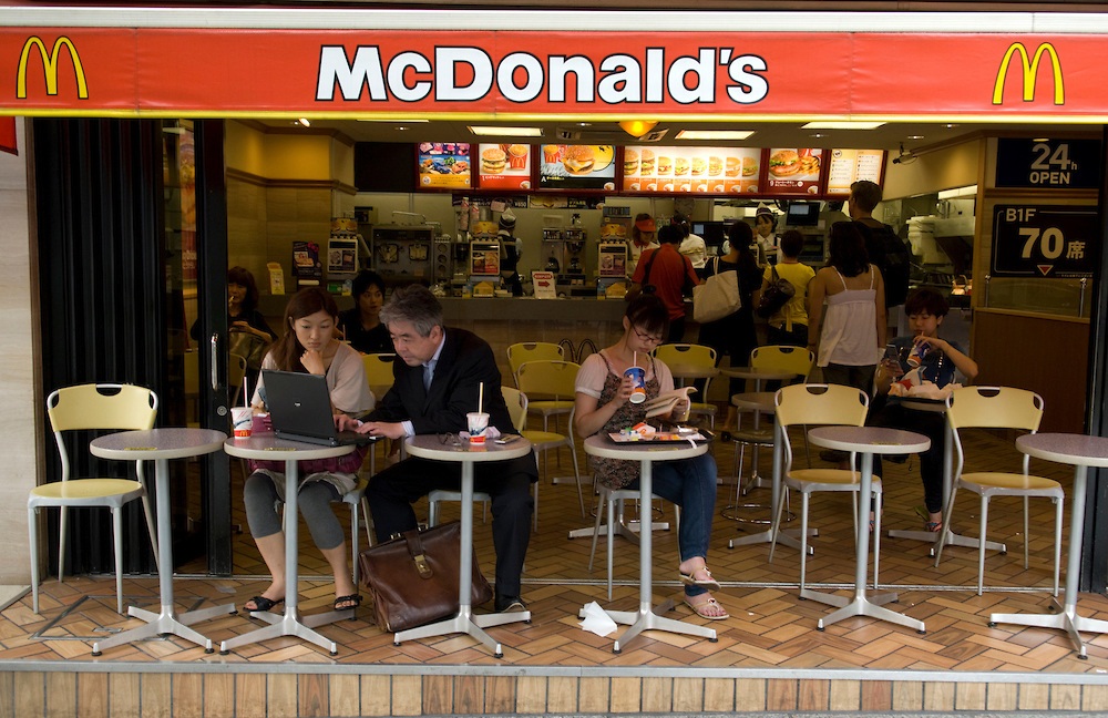 Customers in a McDonald restaurant in Omote-Sando dori, Tokyo.