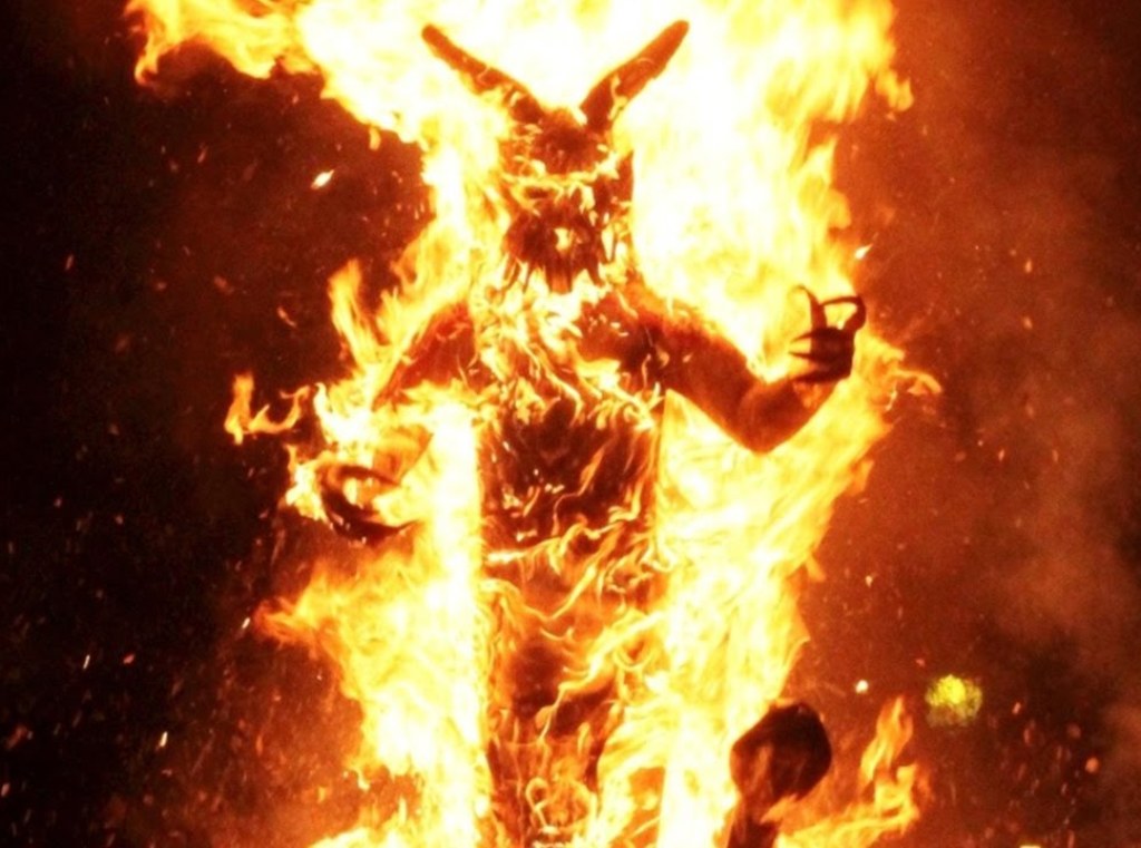burning scarecrows