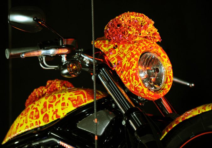 Artist Jack Armstrong's "Cosmic Starship" Harley Davidson is unveiled on October 21, 2010 in Marina Del Rey, California. Priced at USD one million, this is the world's first and only million dollar Harley. Armstrong was a protege of Andy Warhol and his paintings retail for 300K to 2M USD. AFP PHOTO / GABRIEL BOUYS